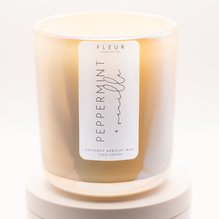 Candle with a label on a white background